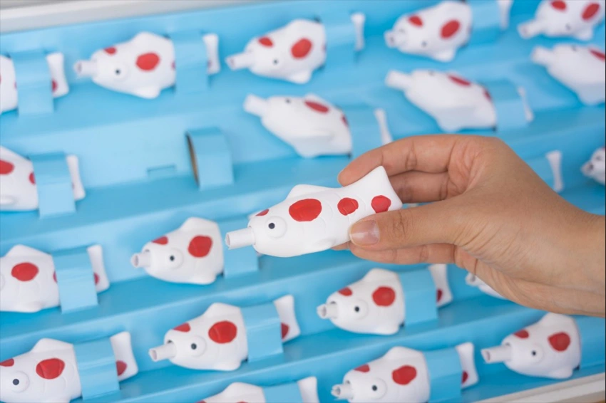 鯉魚造型的御神籤呼應神社內的鯉魚雕像，外型可愛也很值得收藏